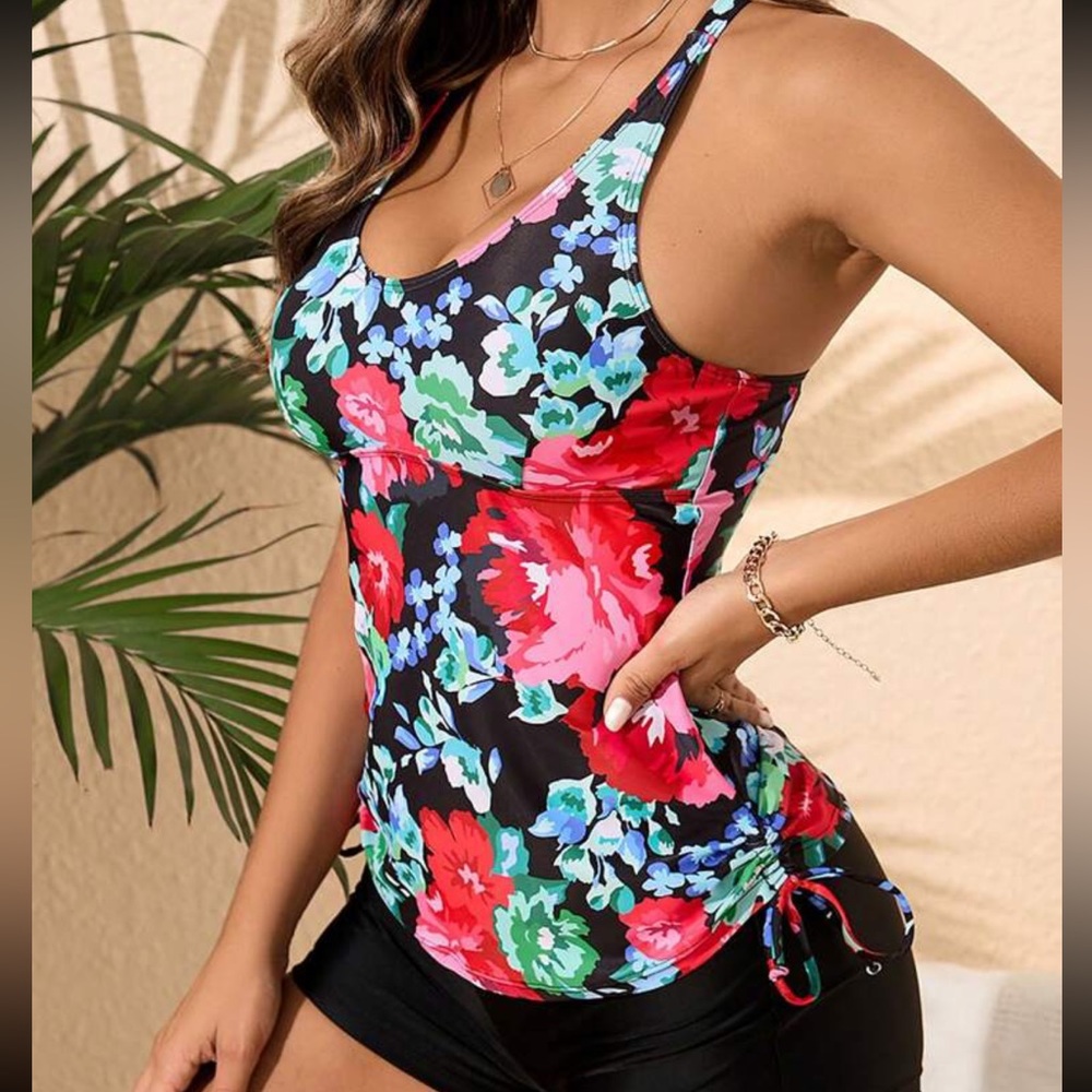 SHEIN two piece floral swimsuit. New, never worn. Size 12. Runs a little small.